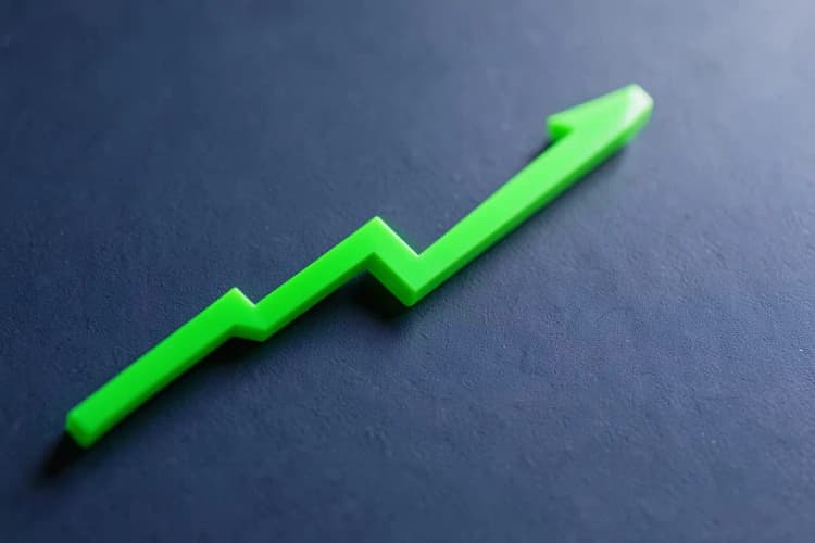 Gráfico de linha ascendente sobre um fundo escuro, simbolizando projeção de crescimento.